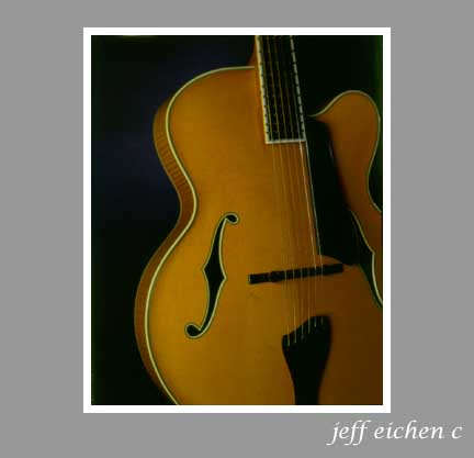 Music-Guitar-1fnl low.jpg (15581 bytes)